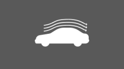 An icon of a vehicle with waves representing aerodynamics is shown. 
