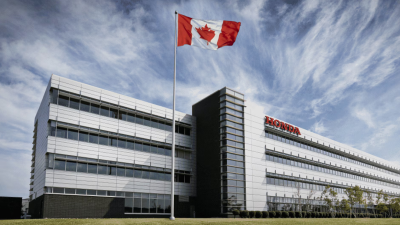 The exterior of the Honda headquarters building is shown. 