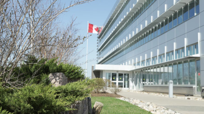 A row of plants are shown outside Honda Headquarters. 